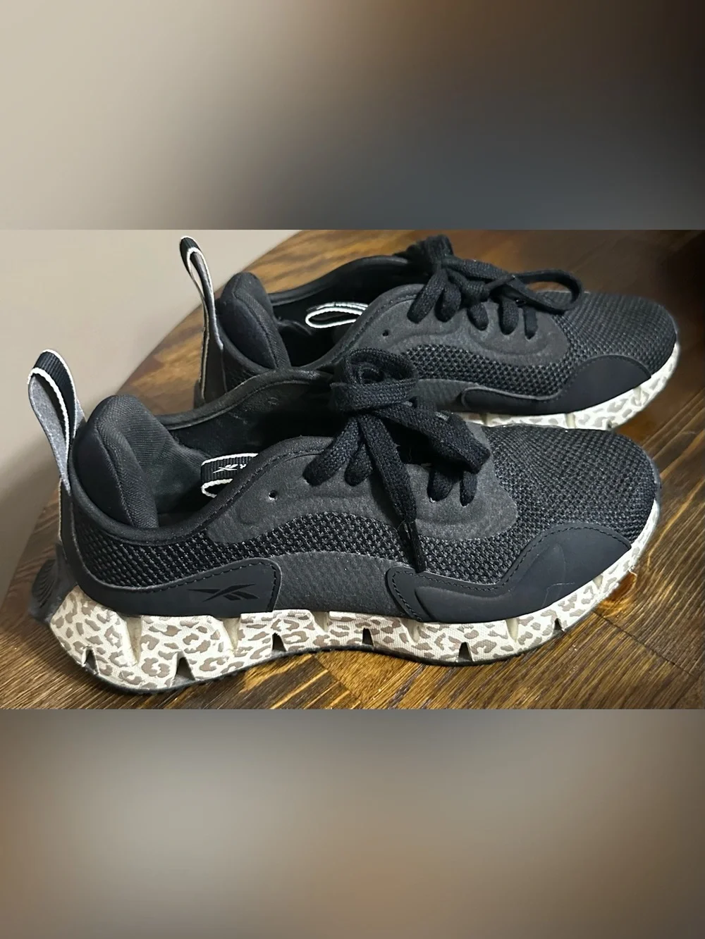 Reebok Black Athletic Sneakers with Leopard-Print Sole